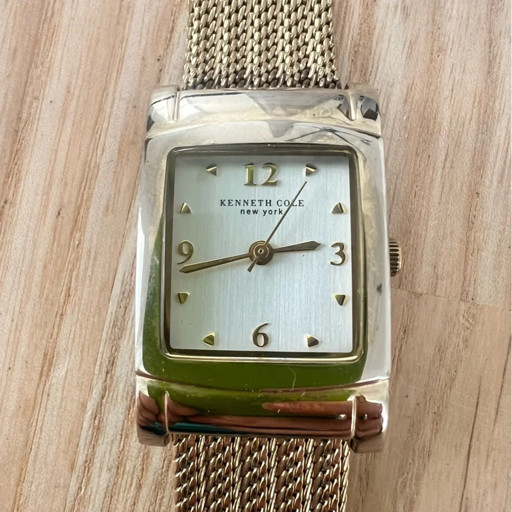 Kenneth Cole New York ladies rectangular gold tone dress watch NEW BATTERY